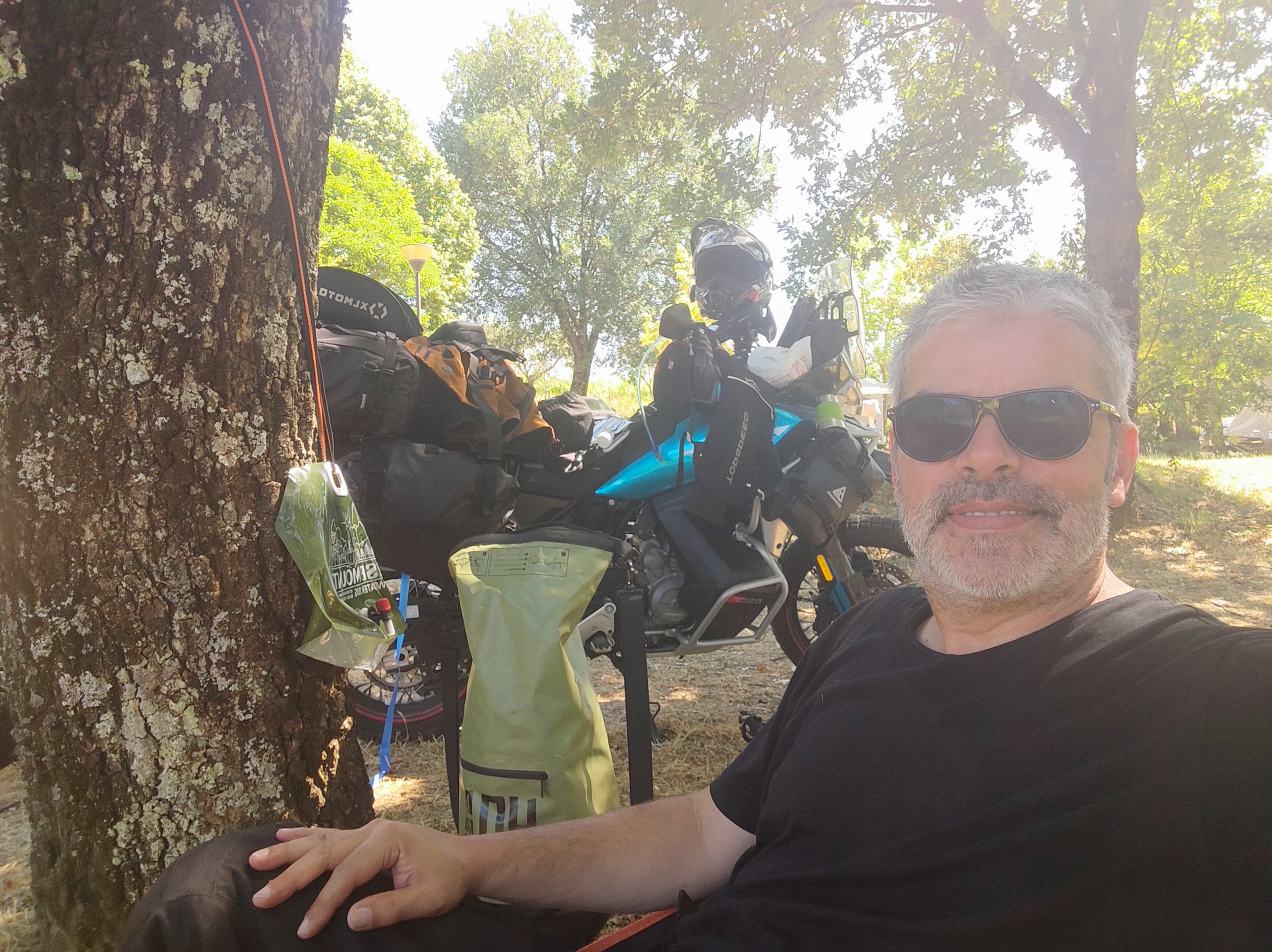 Mike camping with the bike